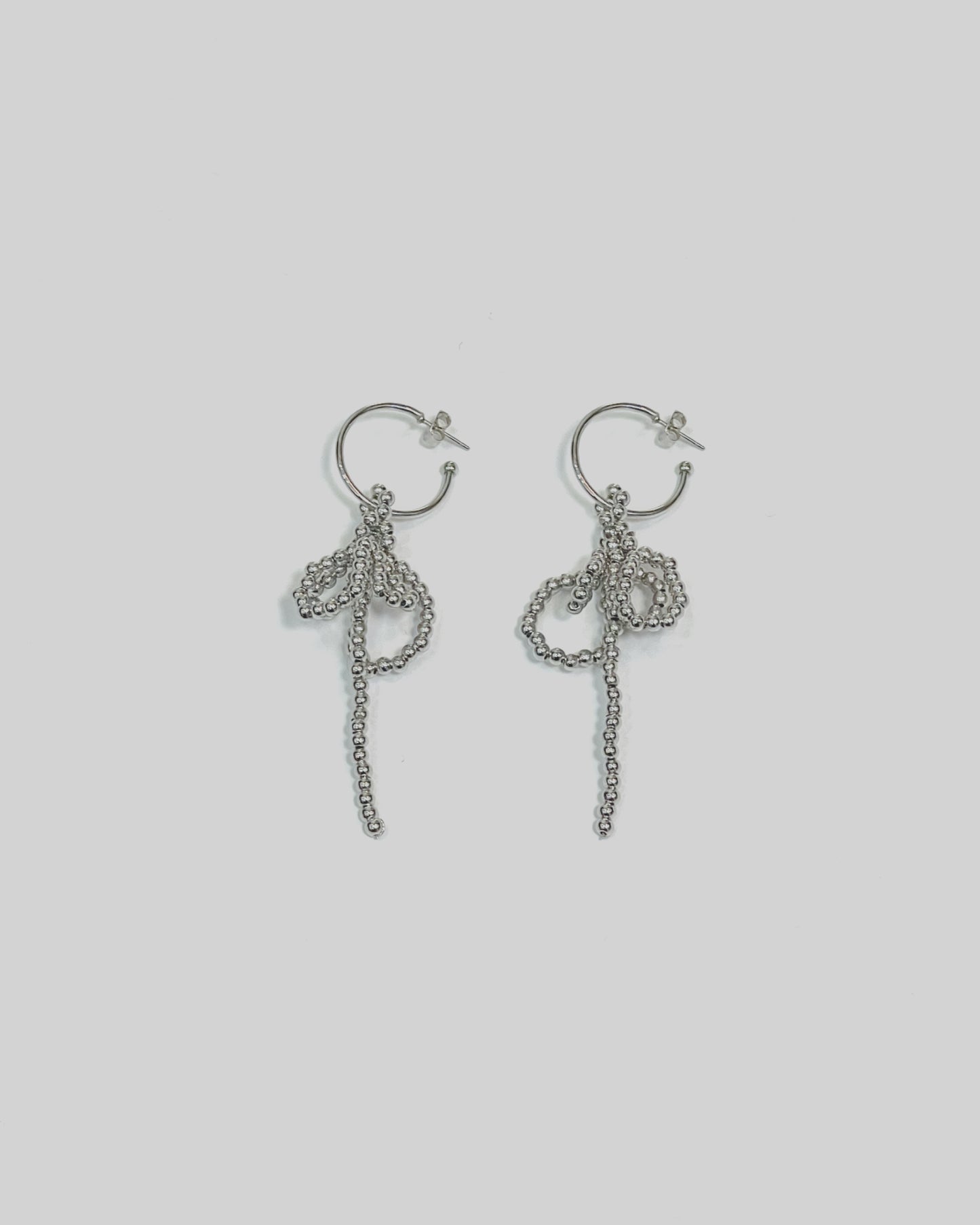 A106 Charming Bowfall Earrings