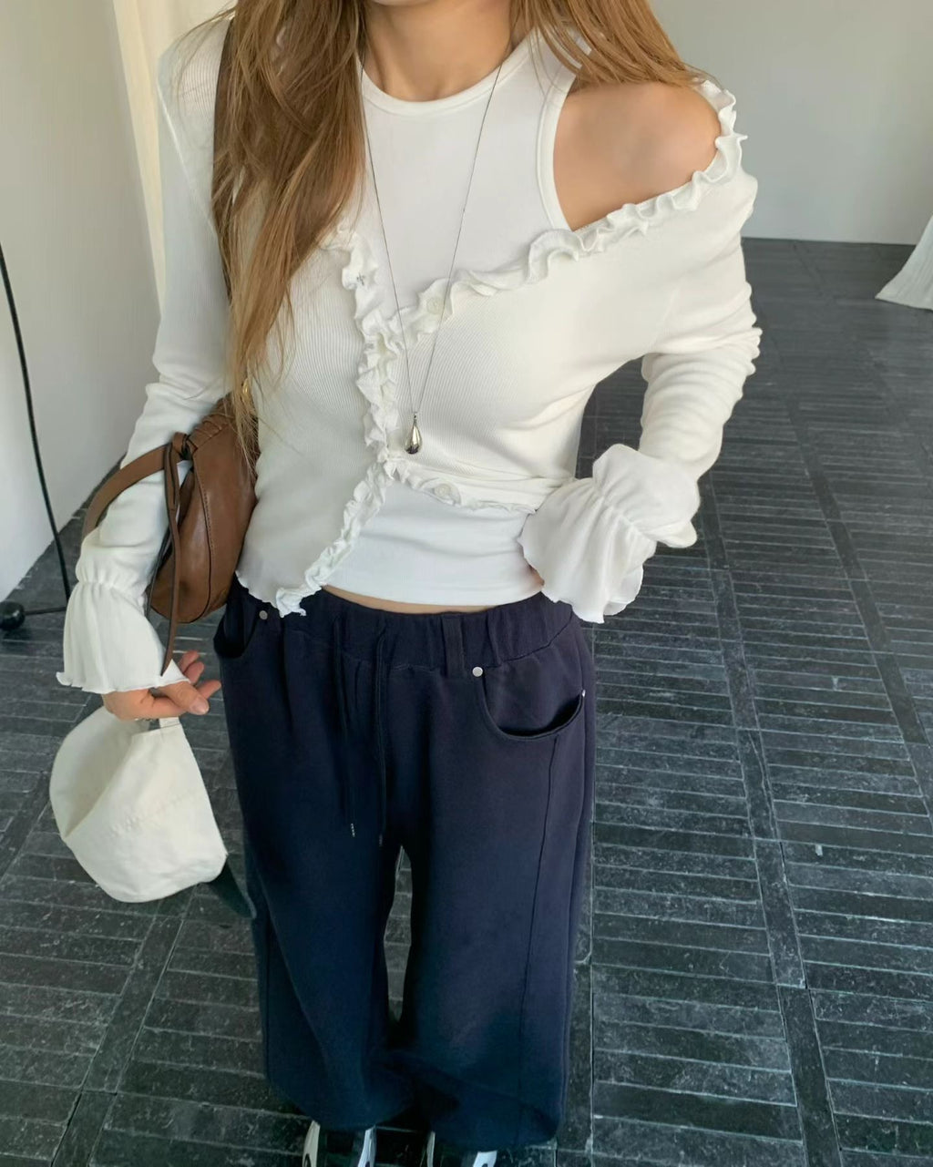 T179 Riot Ruffle Cardigan