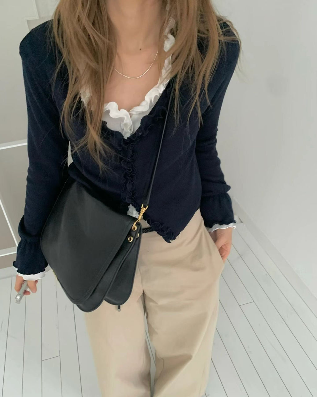 T179 Riot Ruffle Cardigan