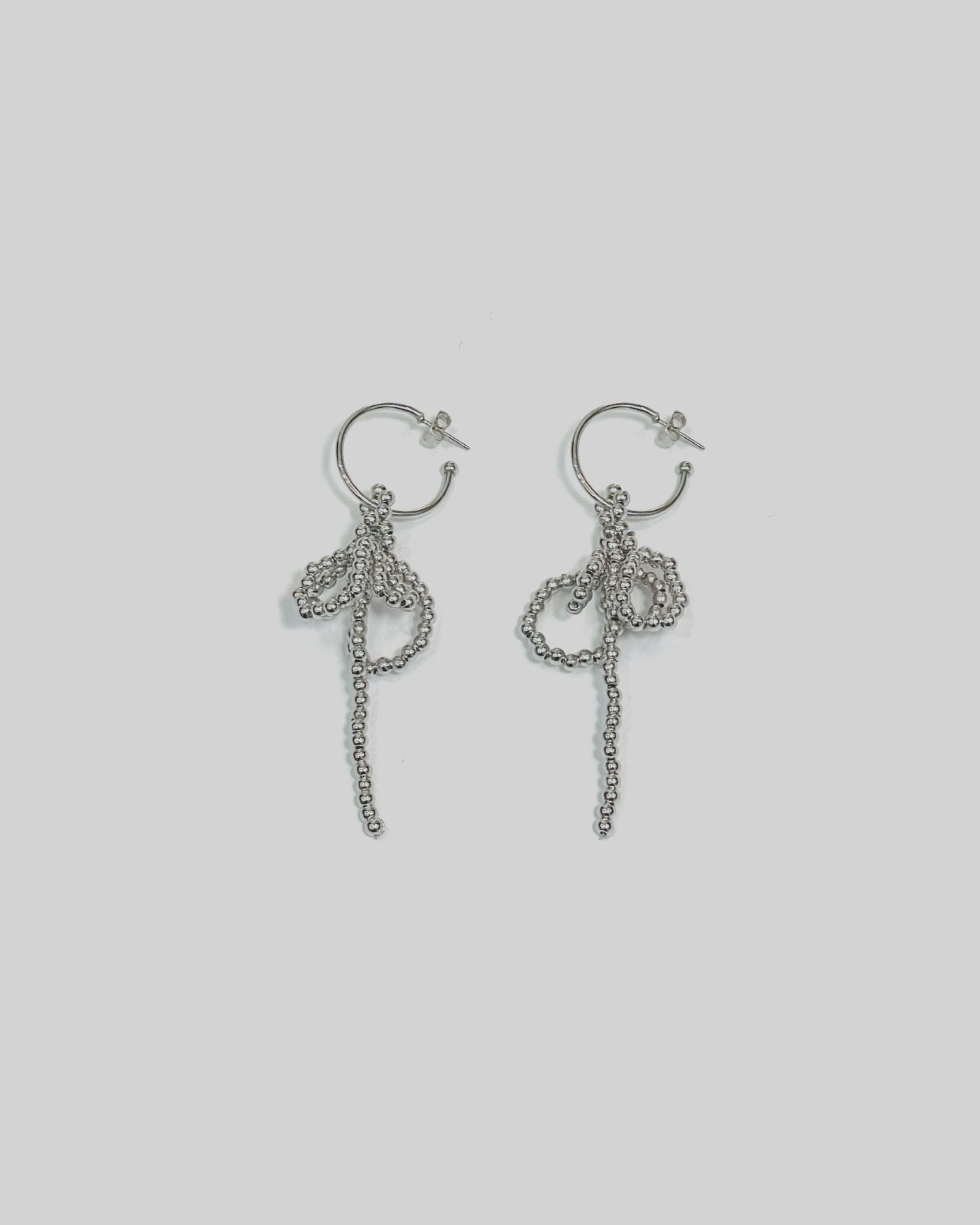 A106 Charming Bowfall Earrings